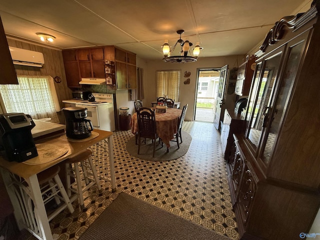 4094 County Road 66, Section, AL 35771 - dining area featuring a wall unit AC and a chandelier