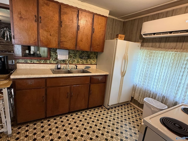 4094 County Road 66, Section, AL 35771 - kitchen featuring an AC wall unit, white appliances, light countertops, a sink, and crown molding
