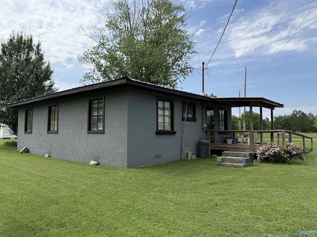 4094 County Road 66, Section, AL 35771 - view of side of property with a yard and concrete block siding
