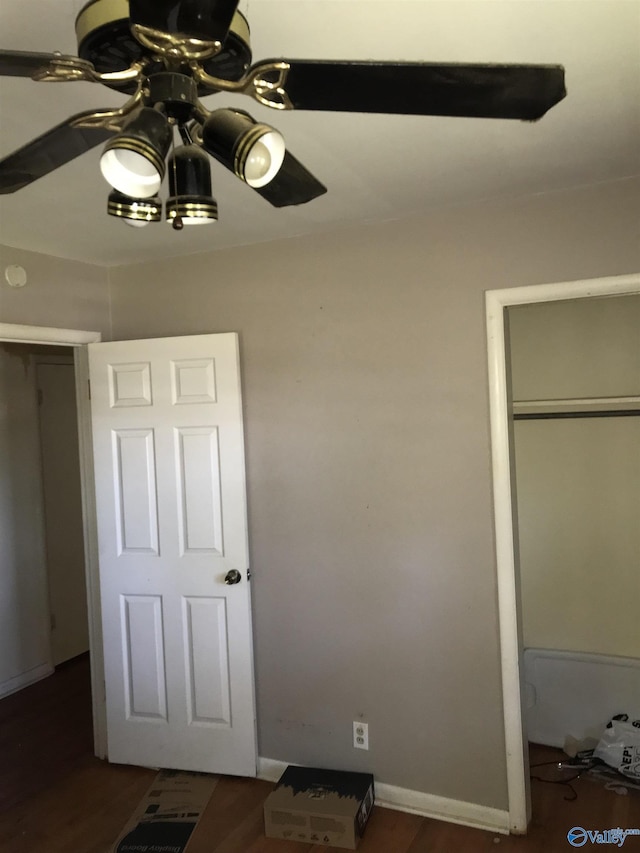 3411 Euclid Dr NW, Huntsville, AL 35810 - unfurnished bedroom featuring wood finished floors and a ceiling fan