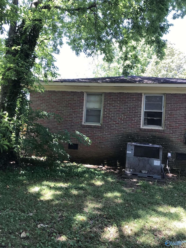 3411 Euclid Dr NW, Huntsville, AL 35810 - view of side of home with brick siding and a lawn