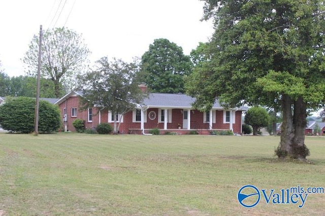 ranch-style house with a front lawn