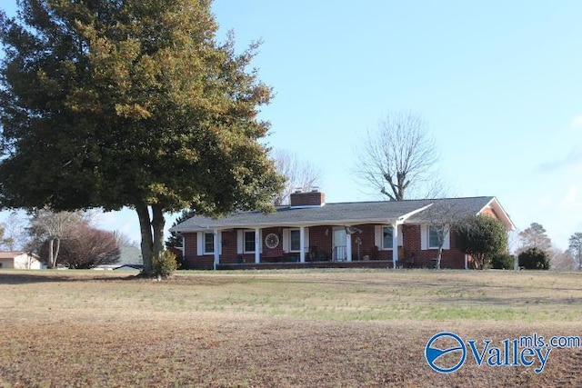 ranch-style house with a front yard