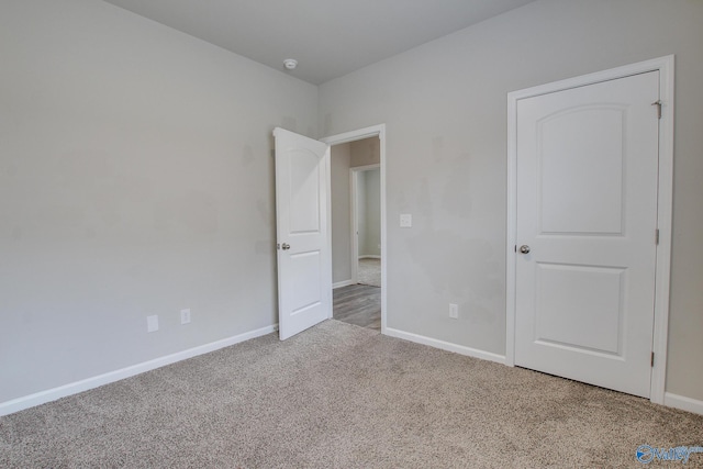 13971 Lannister Ln, Athens, AL 35613 - unfurnished bedroom featuring carpet floors and baseboards