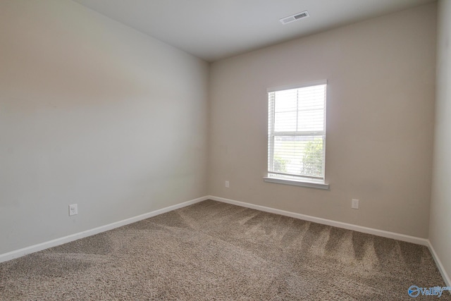 13971 Lannister Ln, Athens, AL 35613 - empty room featuring carpet flooring and baseboards