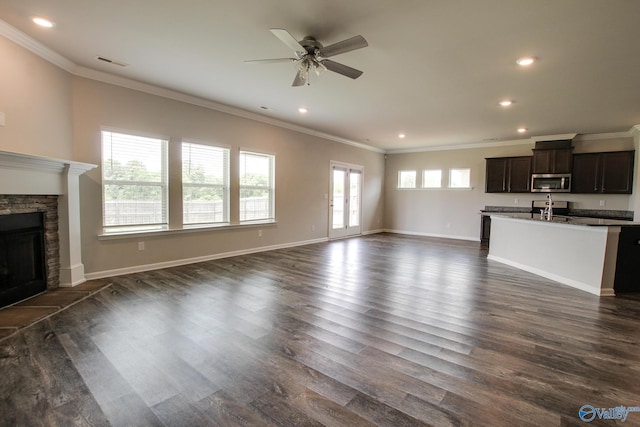 13971 Lannister Ln, Athens, AL 35613 - unfurnished living room with ornamental molding, a sink, a ceiling fan, recessed lighting, and dark wood-style floors