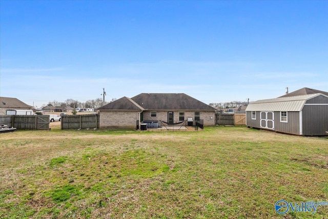 view of yard with a storage unit