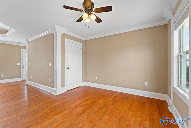 spare room featuring crown molding, ceiling fan, and hardwood / wood-style flooring