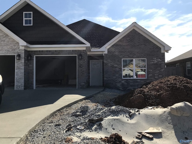 craftsman inspired home with a garage