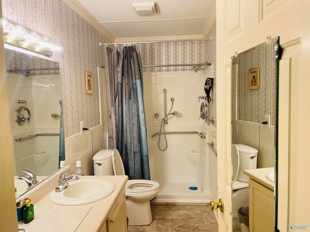 bathroom with a textured ceiling, toilet, vanity, and a shower with curtain