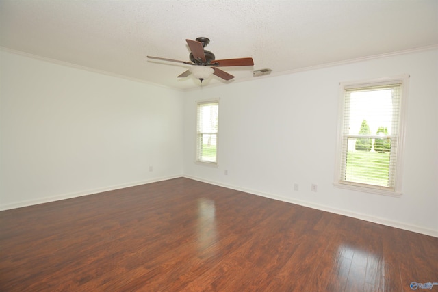 310 Drury Ln, Huntsville, AL 35802 - unfurnished room featuring plenty of natural light, dark wood finished floors, crown molding, and a ceiling fan