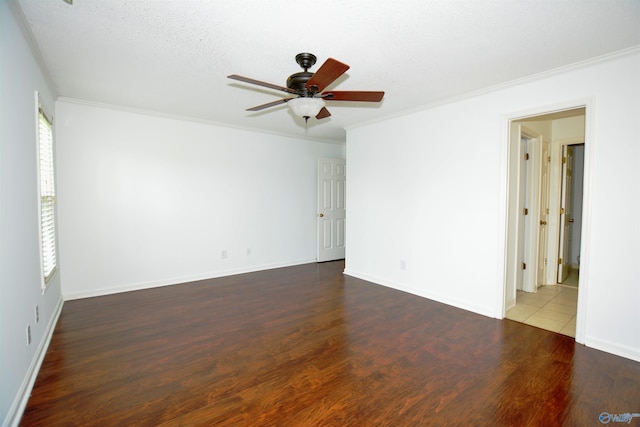 310 Drury Ln, Huntsville, AL 35802 - spare room with ornamental molding, a ceiling fan, and wood finished floors