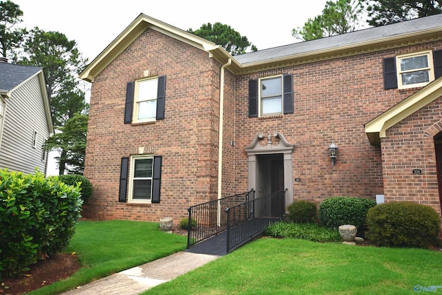 310 Drury Ln, Huntsville, AL 35802 - view of front of house featuring brick siding and a front lawn