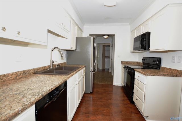 310 Drury Ln, Huntsville, AL 35802 - kitchen with black appliances, ornamental molding, white cabinets, dark wood-style flooring, and washer / clothes dryer