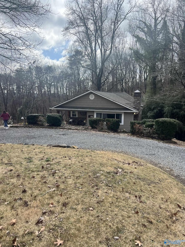 view of front of home with a front lawn