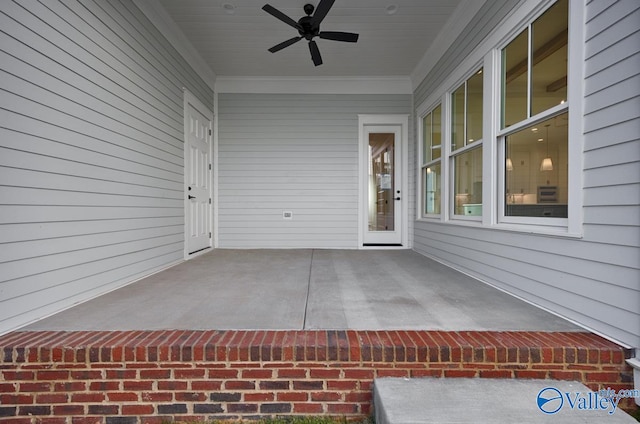 exterior space featuring ceiling fan