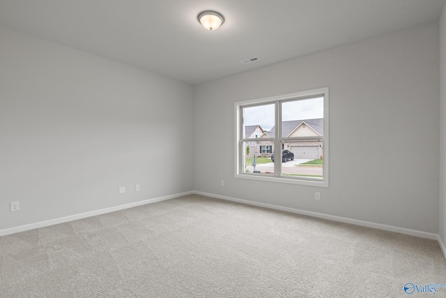 view of carpeted spare room