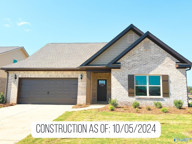 craftsman-style house featuring a garage