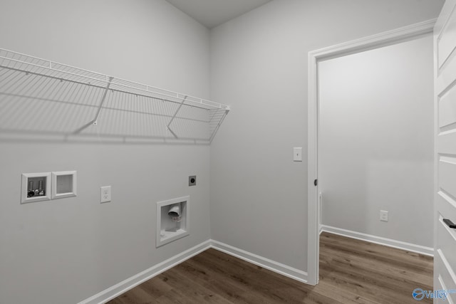 washroom with electric dryer hookup, dark hardwood / wood-style flooring, and hookup for a washing machine