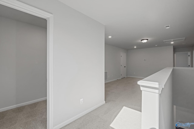 interior space featuring light colored carpet