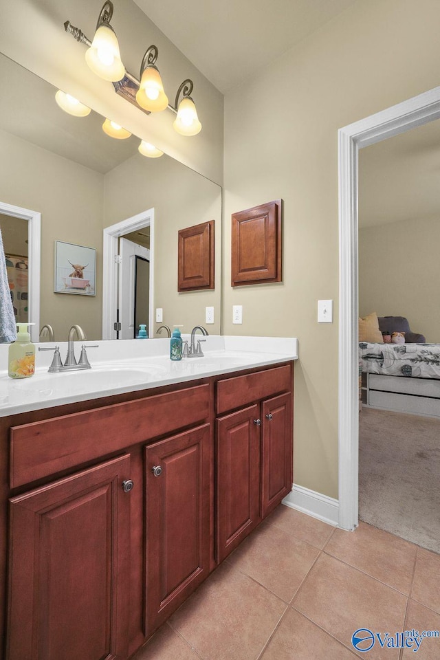 bathroom with vanity and tile patterned flooring