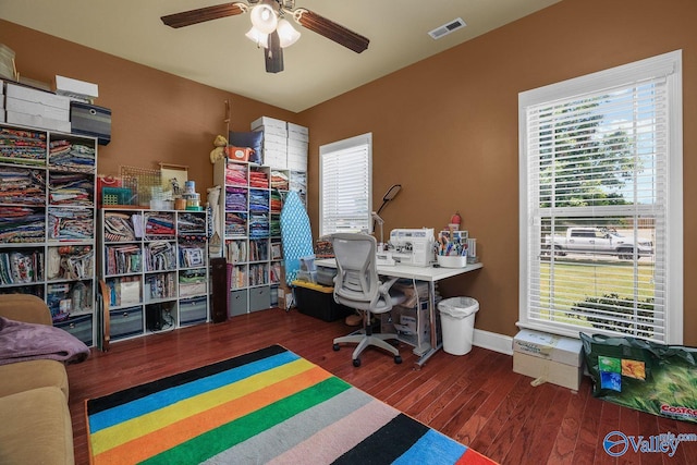 office with dark hardwood / wood-style flooring and ceiling fan