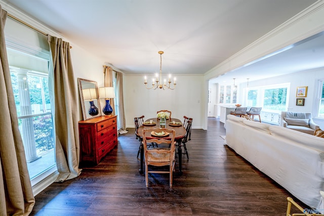 218 Beaver Run Dr, Madison, AL 35758 - dining space featuring a chandelier, dark wood-style flooring, crown molding, and baseboards