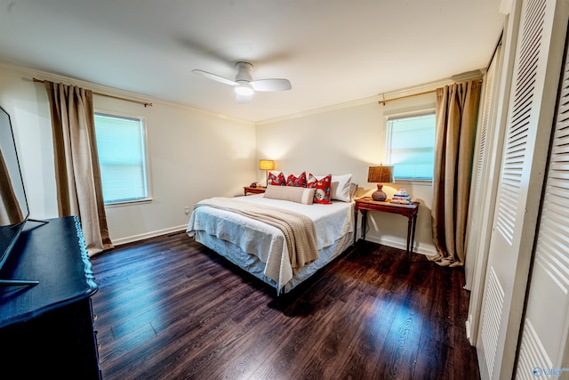 218 Beaver Run Dr, Madison, AL 35758 - bedroom with wood finished floors, multiple windows, crown molding, baseboards, and a ceiling fan