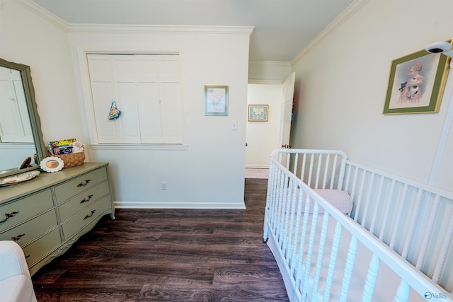 218 Beaver Run Dr, Madison, AL 35758 - bedroom with dark wood-style floors, ornamental molding, baseboards, and a crib