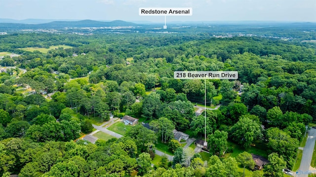218 Beaver Run Dr, Madison, AL 35758 - aerial view of property's location featuring a heavily wooded area
