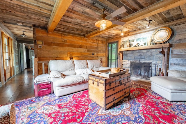 living area with wood walls, wood ceiling, hardwood / wood-style floors, and beamed ceiling