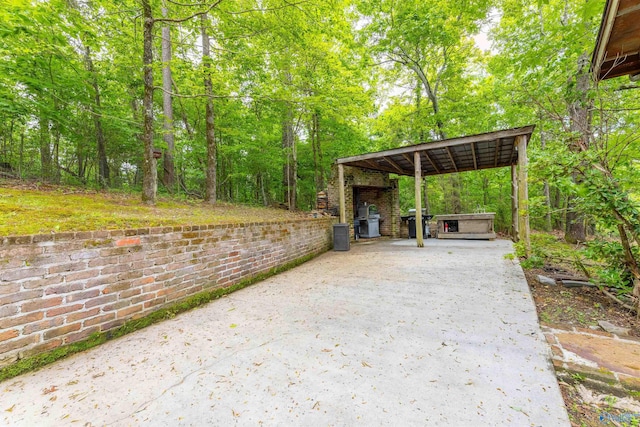 exterior space with a carport