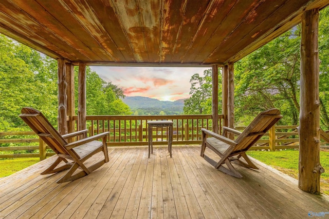 wooden deck featuring a mountain view