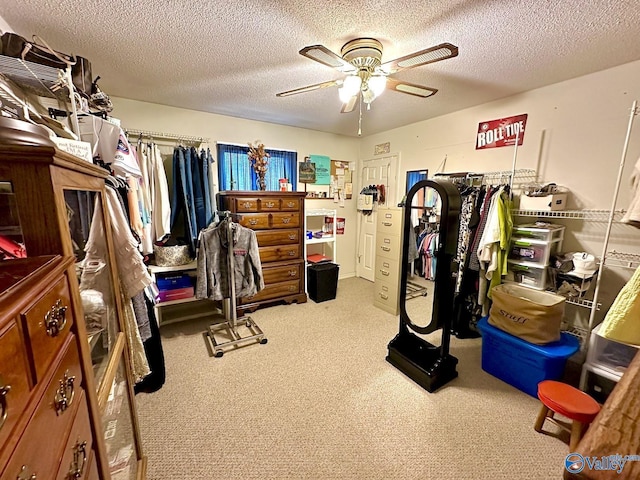 interior space with carpet flooring and ceiling fan
