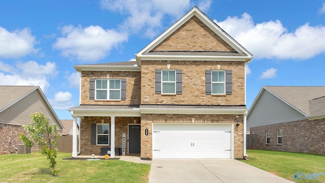 139 Morning Dew Rd, Toney, AL 35773 - view of front facade featuring brick siding, an attached garage, a front lawn, driveway, and central AC