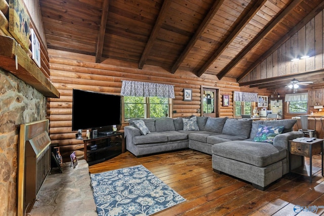 living room with beam ceiling, dark wood-type flooring, wooden ceiling, and high vaulted ceiling