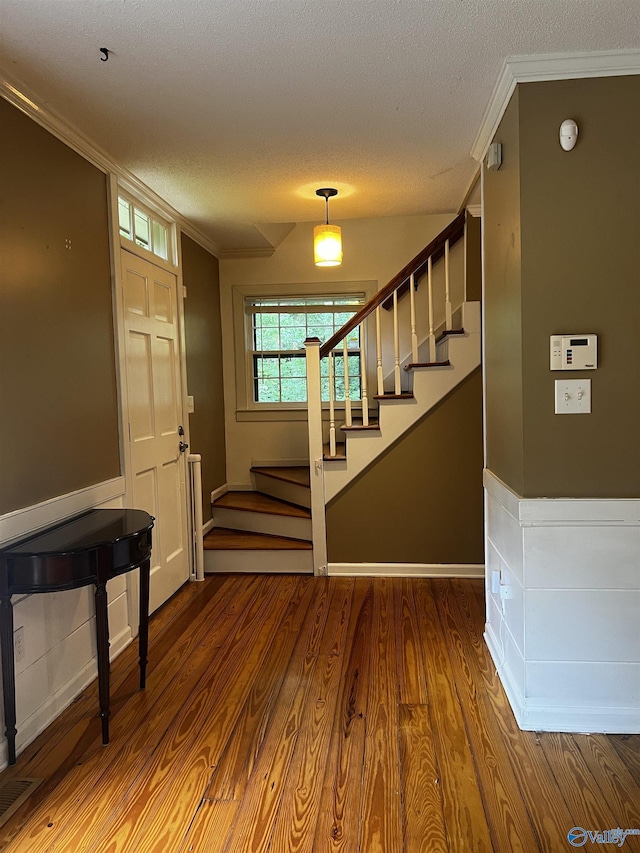 1727 SW Chestnut Mountain Rd, Decatur, AL 35603 - entryway featuring ornamental molding, stairs, wood finished floors, and a textured ceiling