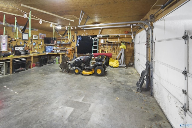 garage with a workshop area