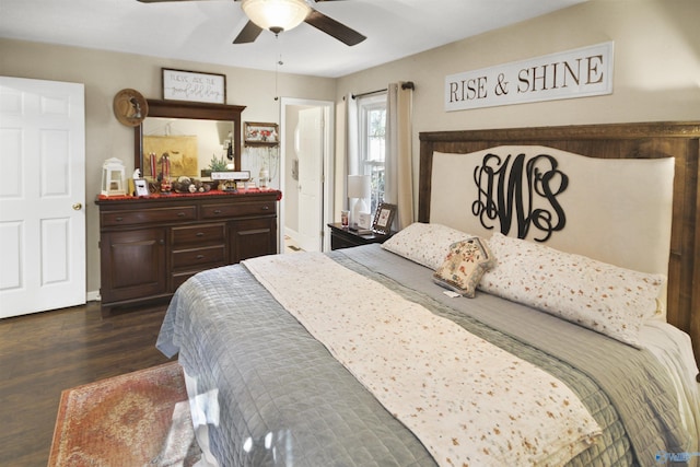 bedroom featuring ceiling fan and dark wood-type flooring