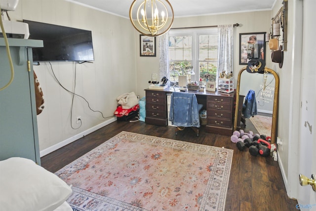 office space with dark hardwood / wood-style flooring, crown molding, and a chandelier