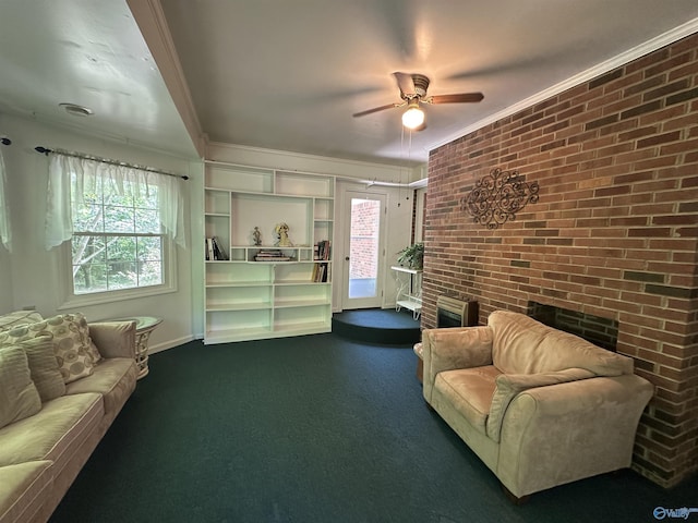 2008 Oakleaf Ln, Arab, AL 35016 - carpeted living room featuring ceiling fan, brick wall, crown molding, a fireplace, and baseboards