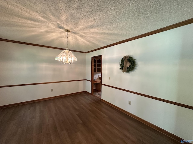 2008 Oakleaf Ln, Arab, AL 35016 - unfurnished room featuring dark wood-style flooring, a textured ceiling, and an inviting chandelier