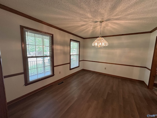 2008 Oakleaf Ln, Arab, AL 35016 - empty room with dark wood-style flooring, a notable chandelier, visible vents, and a textured ceiling