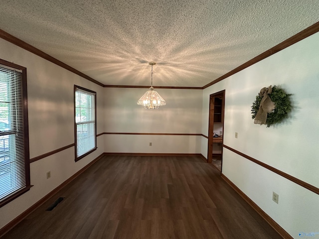 2008 Oakleaf Ln, Arab, AL 35016 - unfurnished dining area featuring an inviting chandelier, dark wood finished floors, a textured ceiling, and visible vents
