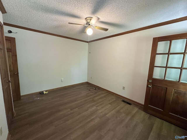 2008 Oakleaf Ln, Arab, AL 35016 - spare room featuring a ceiling fan, a textured ceiling, visible vents, dark wood finished floors, and ornamental molding
