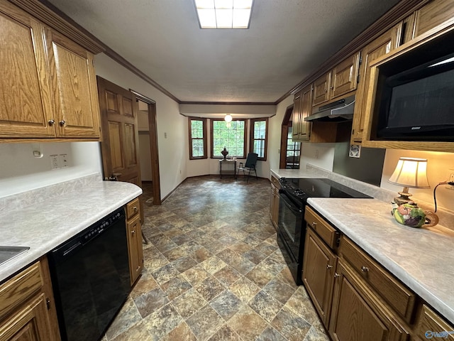 2008 Oakleaf Ln, Arab, AL 35016 - kitchen featuring light countertops, stone finish flooring, under cabinet range hood, ornamental molding, and black appliances