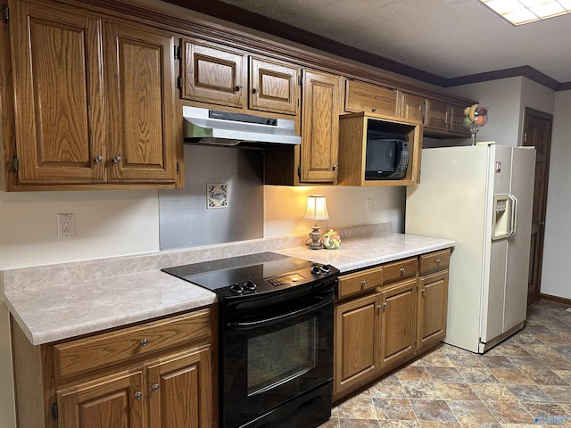 2008 Oakleaf Ln, Arab, AL 35016 - kitchen featuring under cabinet range hood, stone finish flooring, black appliances, and light countertops