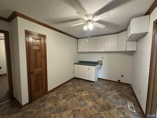 2008 Oakleaf Ln, Arab, AL 35016 - washroom with cabinet space, ceiling fan, baseboards, electric dryer hookup, and visible vents
