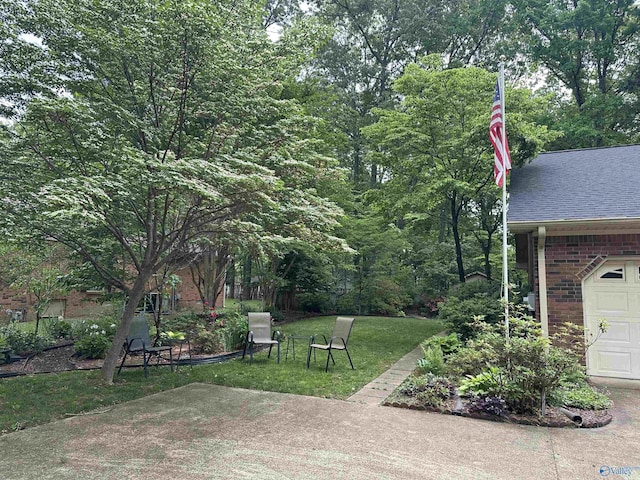 2008 Oakleaf Ln, Arab, AL 35016 - view of yard with a garage
