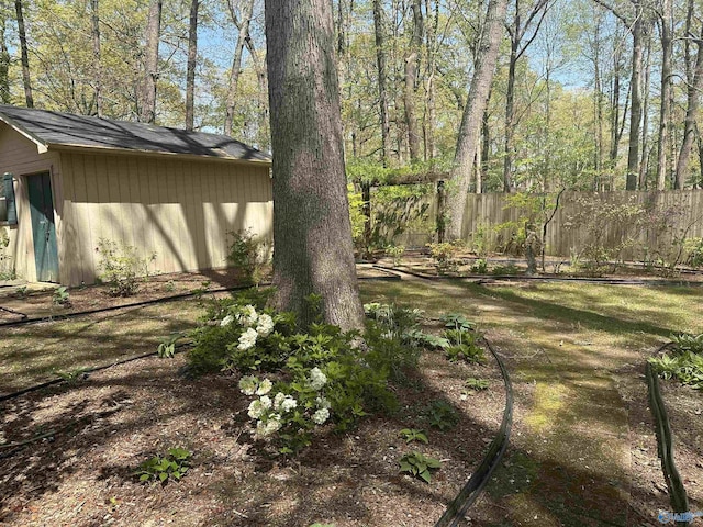 2008 Oakleaf Ln, Arab, AL 35016 - view of yard featuring fence and an outbuilding